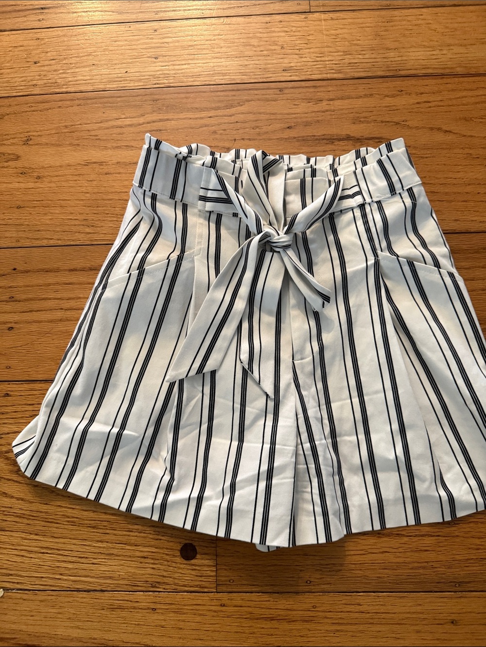 Zara White with Black Vertical Stripes and Front Tie shorts.